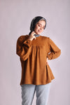 Camel knitted sweater.